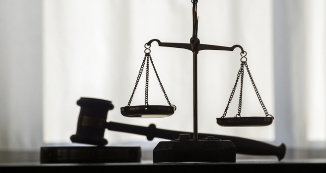 Man jailed for murder of insurance broker scales of justice and judge's gavel