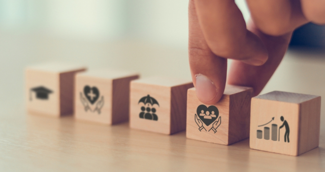 LifeSearch launches new 'perks' hub to promote health & wellbeing wooden blocks on a table depicting medical help scenarios