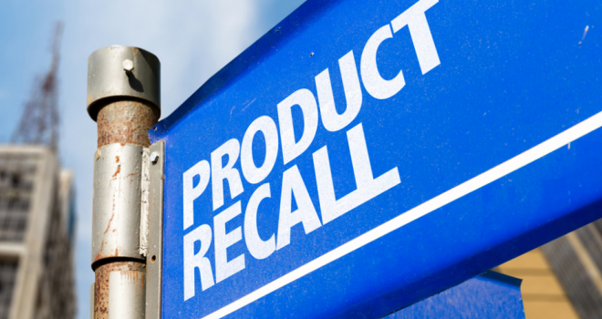 signpost with 'product recall' written on it 